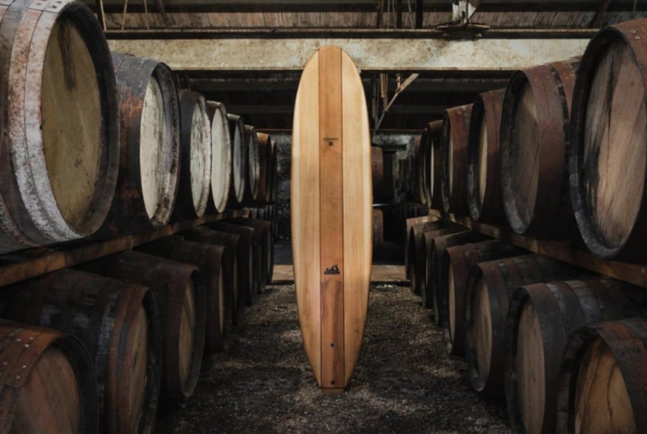 A Surfboard Made From Whiskey Barrels