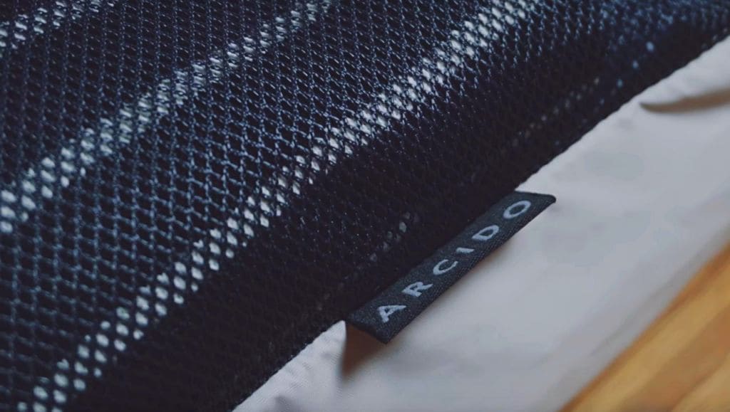 Arcido Akra backpack logo