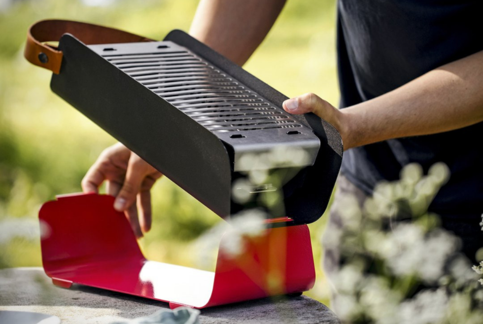 The travel-ready UNA Portable Charcoal Grill is compact, versatile, and reliable