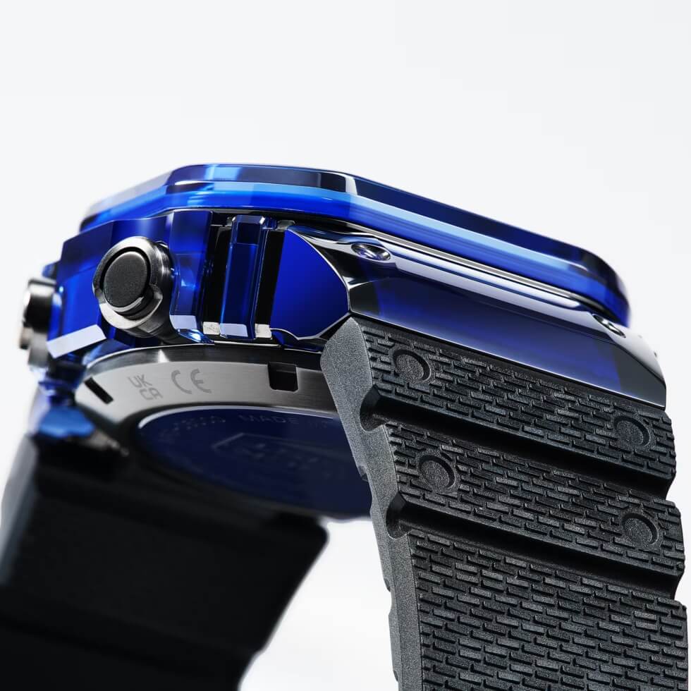 Grade 5 titanium caseback of the Casio MRG-D5000 with blue sapphire insert